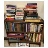 Solid wooden bookshelf with book contents.