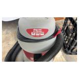 Shop-Vac all around unit with bag of adapters.