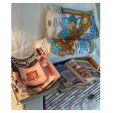 Crafting supplies including box of cross stitch