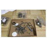 Lock repair parts and random fasteners.