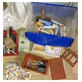 Bin full of various painting supplies, tools, &