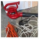 Toro Power Sweep with assorted extension cords.