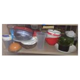 Shelf lot of plastic kitchen items. Buyer takes