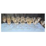 Amber tinted wine and martini glasses. 21total.