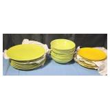 Ceramic plates and bowls. Green dinner plates and