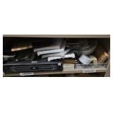 Shelf lot of kitchen items.