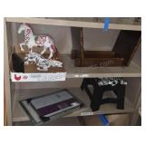 Miscellaneous items on two shelves