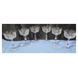 Stemmed sherbet glasses etched with rose design