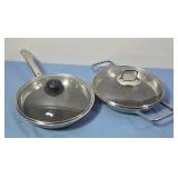 WMF honeycomb stainless steel pans with lids.