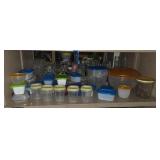 Shelf lot of plastic storage containers with