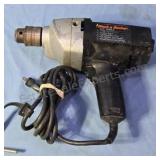 Black and Decker ½in corded drill. Includes chuck