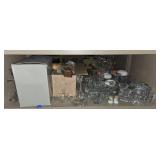 Shelf lot of candle holders. Buyer takes what