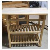 Wooden kitchen cart. Missing one drawer. We may