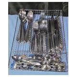 Stainless flatware in Stainless steel tray.