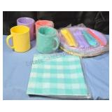 Picnic set. Missing one fork and spoon.