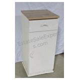 Steel cabinet with Formica top. Mounted on wooden