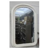Wood framed mirror with rounded top. 32×20½