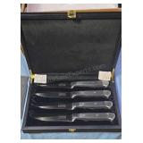 The Capital Grille steak knive sets. Two sets of