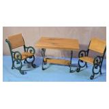 Doll display table and chairs.