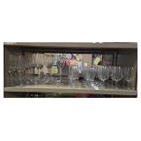 Wine glasses on one shelf. Buyer takes what they