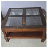 Coffee table with glass inserts. 19½×40×40.
