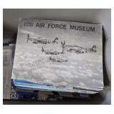 Vintage airplane magazines in one tote.