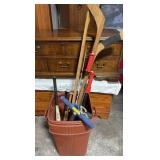 Trash Can W/ Baseball Bats Hockey Sticks Scooter