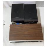 Vintage 8 track tape stereo with speakers.