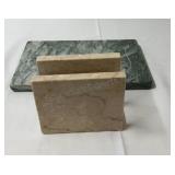 Marble napkin holder and marble cutting board.