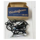 Vintage Westinghouse clothing iron new in box.