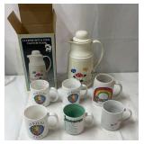 Coffee mugs and flask.
