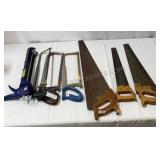 Hand saws, hack saws and a large calk gun.