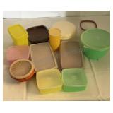 12 Tupperware containers with lids.
