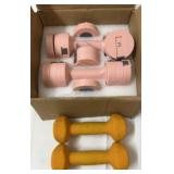 Workout dumbbells. One has adjustable weight.