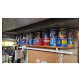 Shelf of Empty Coffee Tins 2 Rows deep
