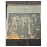 LP.  Queen " The Game" 1970 promo LP. Foil sleeve