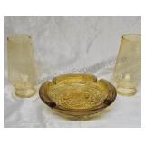 Ashtray and hurricanes in amber glass