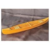 Handmade toy canoe with  paddles. 15ï¿½ins.