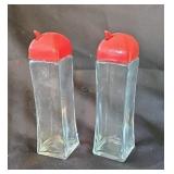 Glass oil and vinegar dispensers with plastic