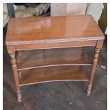Walnut side table with two shelves and turned