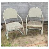 Vintage metal patio chairs with scalopped back.