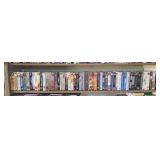 Shelf of opened VHS tapes