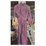 Vintage black and red dress with leaf pattern.