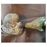 Wolf Original soapstone craved beaver and walrus.