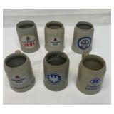 Stoneware beer steins made in Germany.