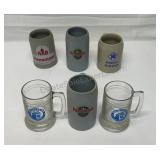 4 German made stoneware beet steins and 2 glass