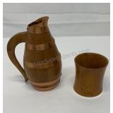 Wood cup and pitcher.