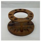 Wooden pipe holder.