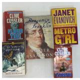 Assortment of different genre of books.