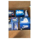 9 piece set Christmas nativity collectibles.